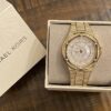 Michael Kors Lennox Three Hand Crystals White Dial Gold Steel Strap Watch For Women - MK6991